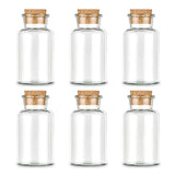 Sechs leere, große Korkengläser von Ankerkraut auf weißem Hintergrund.