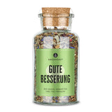 Gute Besserung Kräutertee von Ankerkraut im Korkenglas auf weißem Hintergrund.