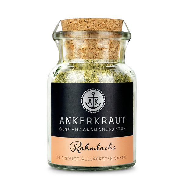 Ankerkraut Rahmlachs Gewürz im Korkenglas auf weißem Hintergrund.