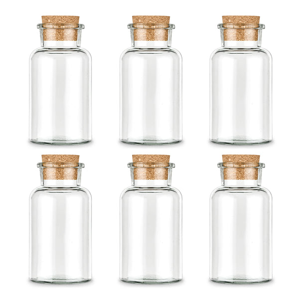 Sechs leere, große Korkengläser von Ankerkraut auf weißem Hintergrund.