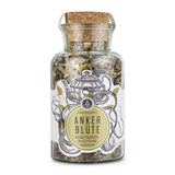 Ankerblüte Kräuterteemischung von Ankerkraut im Korkenglas auf weißem Hintergrund.