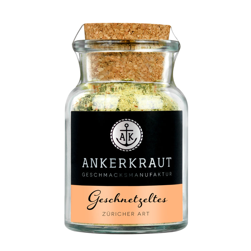 Geschnetzeltes Gewürz von Ankerkraut im Korkenglas auf weißem Hintergrund.