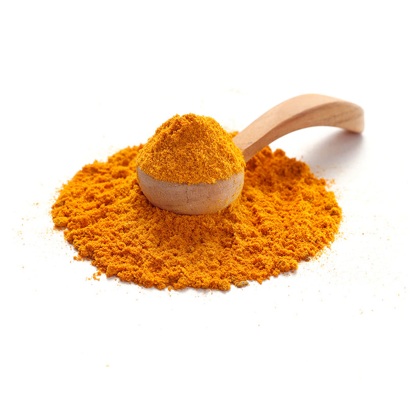 BIO Goldene Milch von Ankerkraut als Häufchen auf einem Gewürzlöffel.