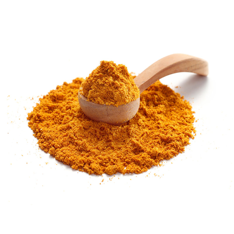 Curry Madras Gewürz von Ankerkraut als Häufchen auf einem Gewürzlöffel.