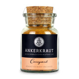 Ankerkraut Currywurst Gewürz im Korkenglas auf weißem Hintergrund.