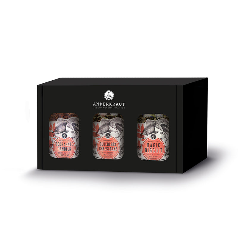 Früchtetee-Set von Ankerkraut, bestehend aus drei Korkengläsern in einer schwarzen Geschenkbox.