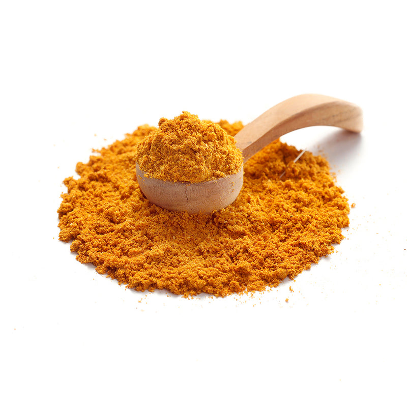 Hamburger Hafencurry von Ankerkraut als Häufchen auf einem Gewürzlöffel.