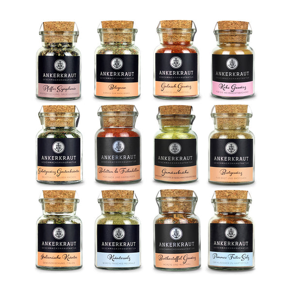 Kochen Ist Liebe Gewürz-Set auf weißem Hintergrund.