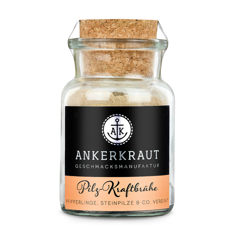 Pilzbrühe von Ankerkraut im Korkenglas auf weißem Hintergrund.