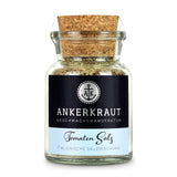 Tomatensalz von Ankerkraut im Korkenglas auf weißem Hintergrund.