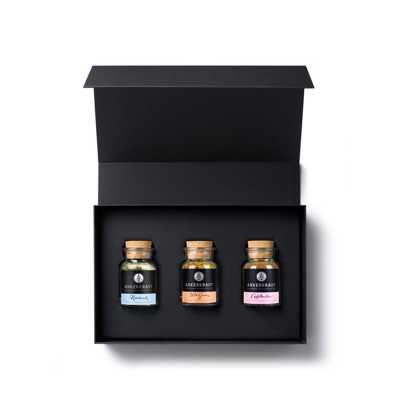 Für Dich Geschenk-Box aus schwarzem Karton mit geöffnetem Deckel und Blick auf den Inhalt.