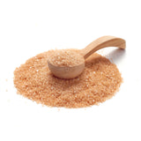 Zimt Zucker Mischung von Ankerkraut als Häufchen auf einem Gewürzlöffel.